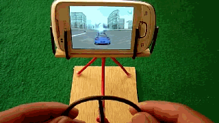 怎样玩手机赛车游戏才有真实感QQ表情gif搞笑图片