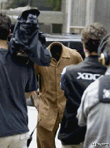 从衣服里面冒出来的脑袋可爱趣图gif搞笑图片