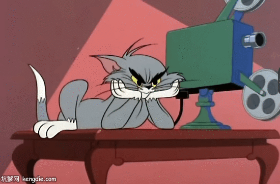 汤姆猫趴在桌子上生气看电影gif动态图片爆笑gif搞笑图片