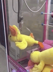 抓娃娃机的搞笑动态图爆笑gif搞笑图片