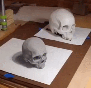 立体骷髅头创意gif搞笑图片