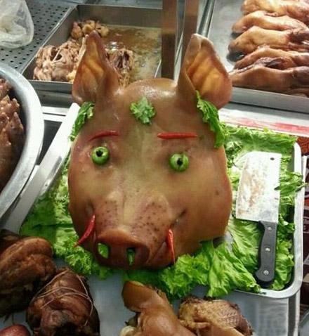 喜感的猪头，就算死也要为主人招揽生意动物gif搞笑图片