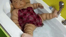 这孩子一看就是当老总的派头!儿童gif搞笑图片