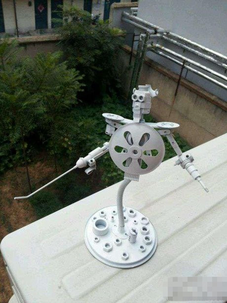 用废旧零件做的那个啥器物gif搞笑图片