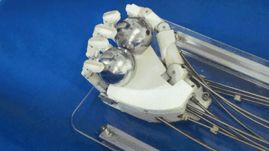 科学家发明了一个不得了的机器手器物gif搞笑图片