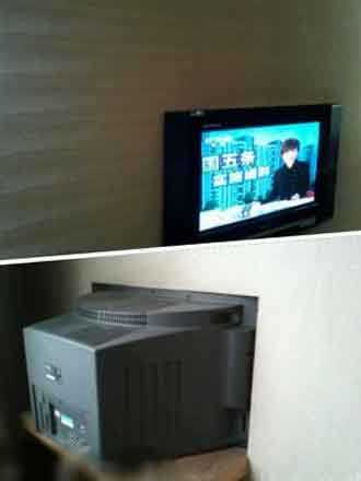 酒店平板电视，伤不起器物gif搞笑图片