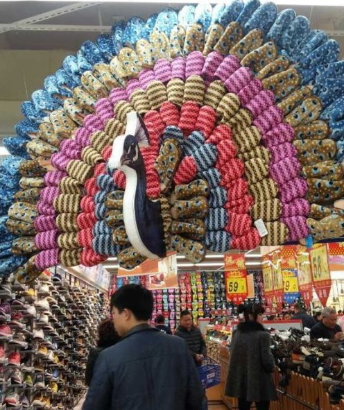 有才的鞋店器物gif搞笑图片