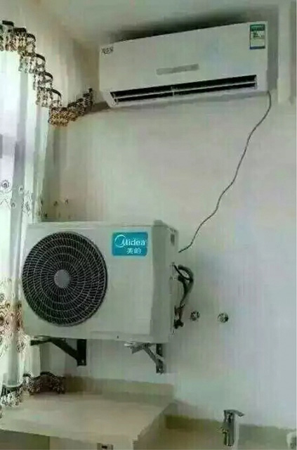 空调主机这么贵重的东西怎么能安装在室外呢器物gif搞笑图片