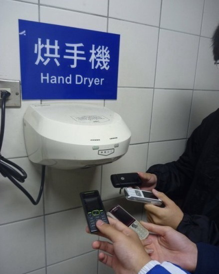 烘手机器物gif搞笑图片