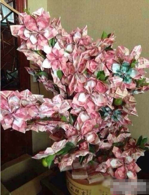 这束花叫做＂有钱花＂器物gif搞笑图片