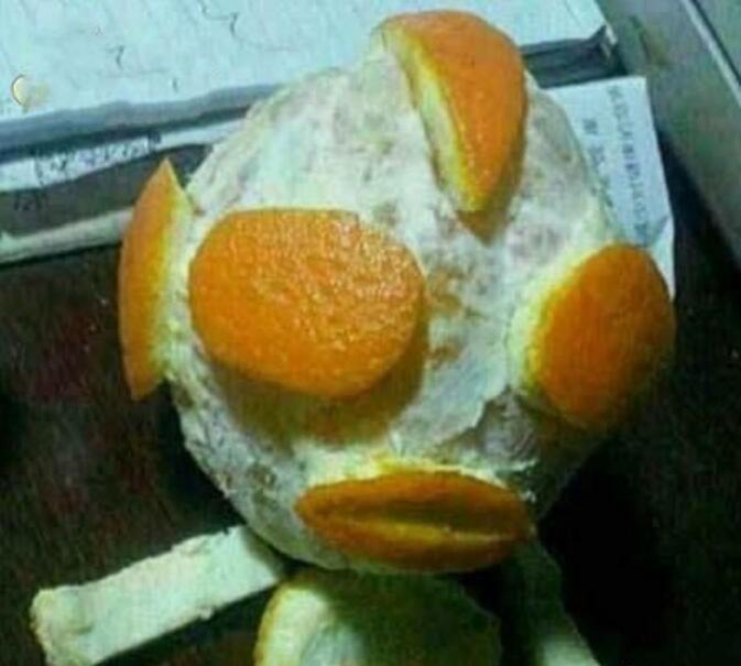 剥个橙子也得瑟植物gif搞笑图片