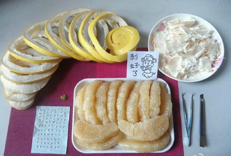 给大家看看什么叫专业剥柚子植物gif搞笑图片