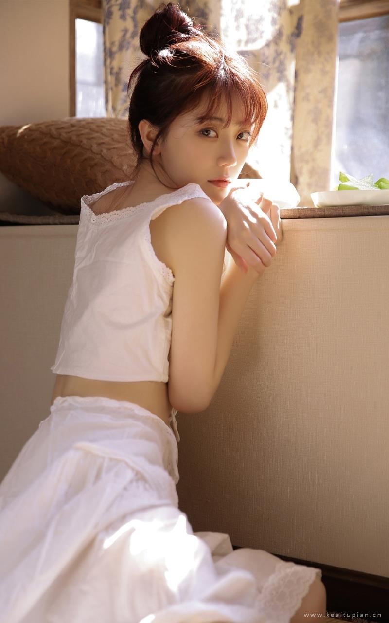可爱养眼的丸子头少女唯美私房写真图片