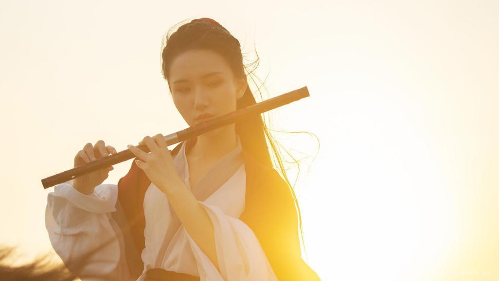 一剑一萧走天涯的红衣侠女冷艳古风美女写真图片