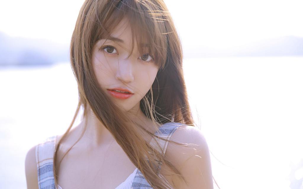 港风梦幻长发美女海边写真图片桌面壁纸