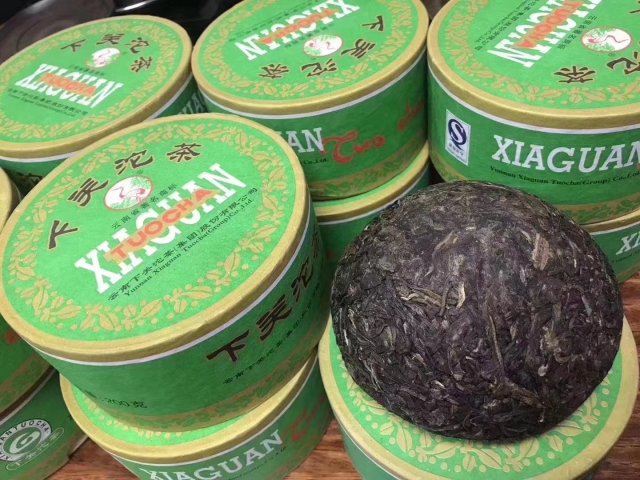 2015年下关沱茶生茶介绍，2015年下关沱茶生茶边销砖价钱怎么样？